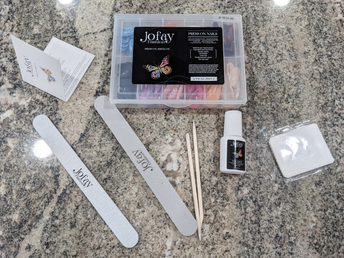 jofay nail kit box with nail files, glue and more
