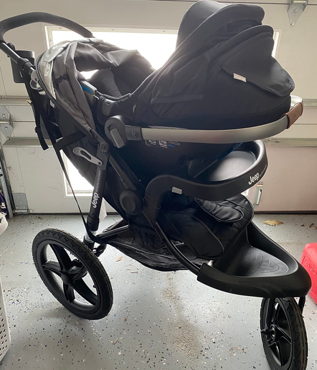 jeep jogging stroller with car seat in it