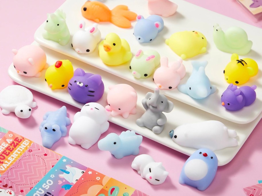 lots of squishy toys with cards