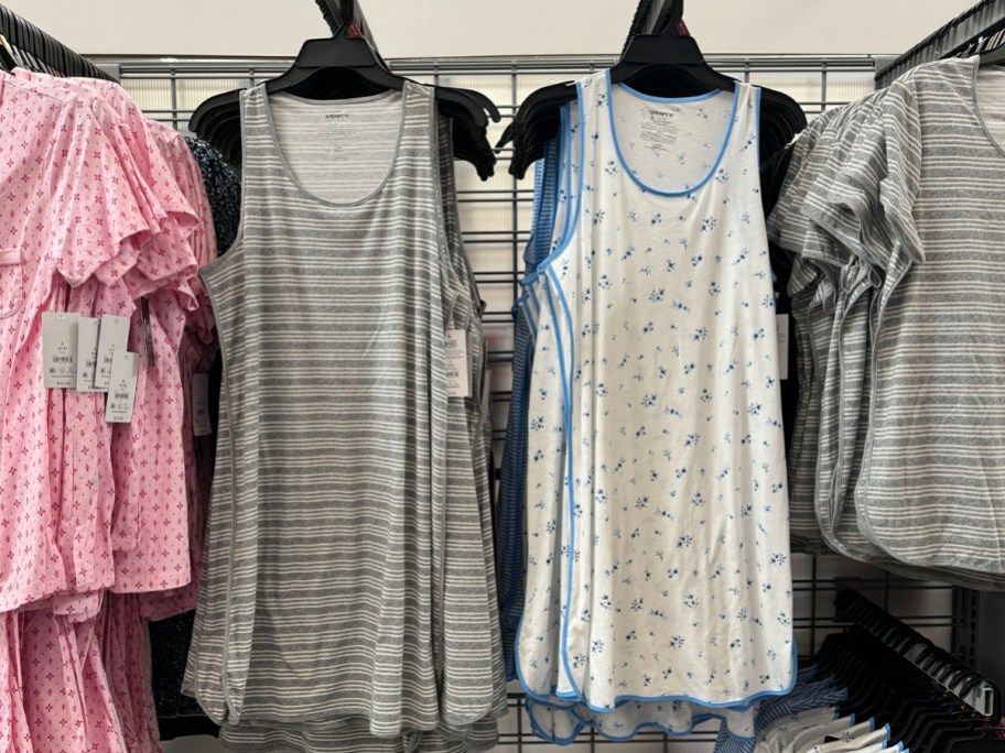 gray and white sleeveless nightgowns hanging at walmart