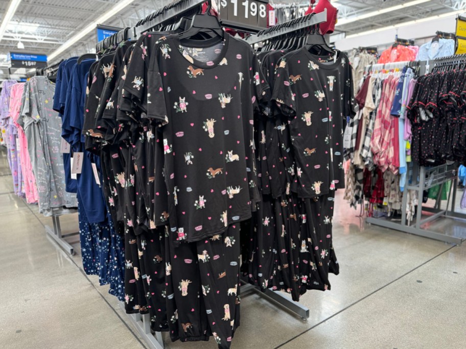 black pajamas sets hanging in walmart store