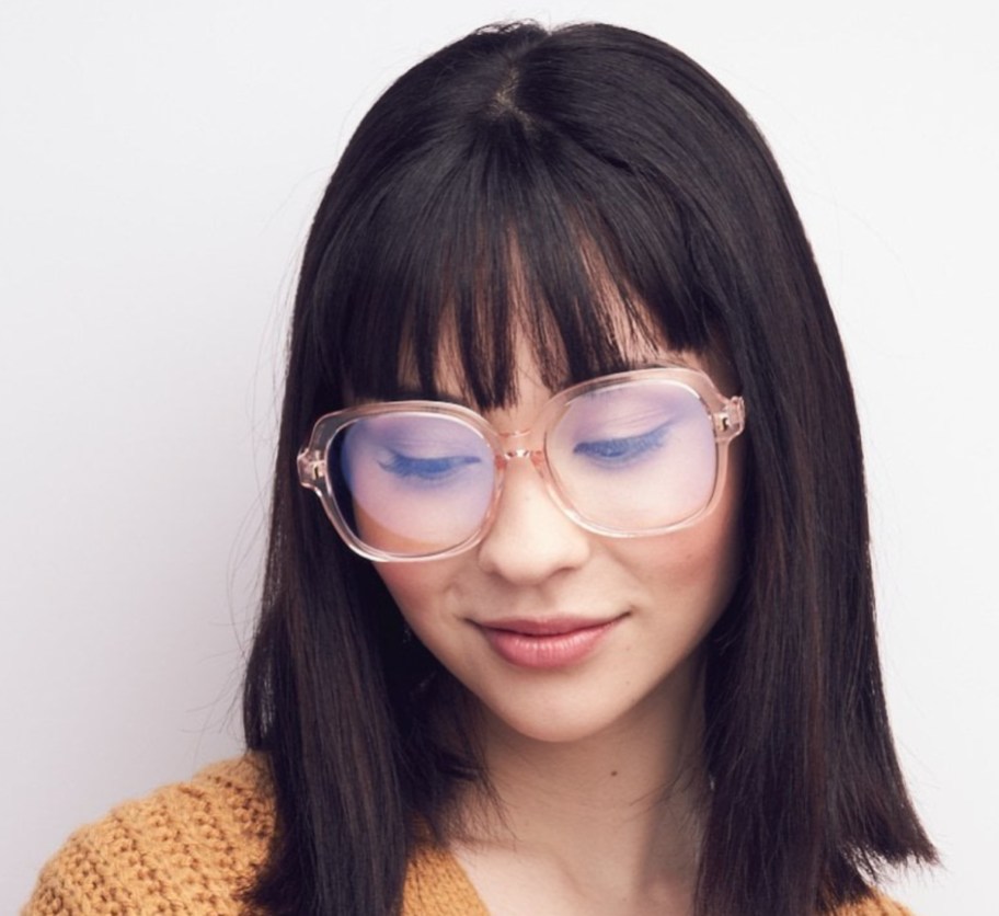 woman in pink crystal kits glasses