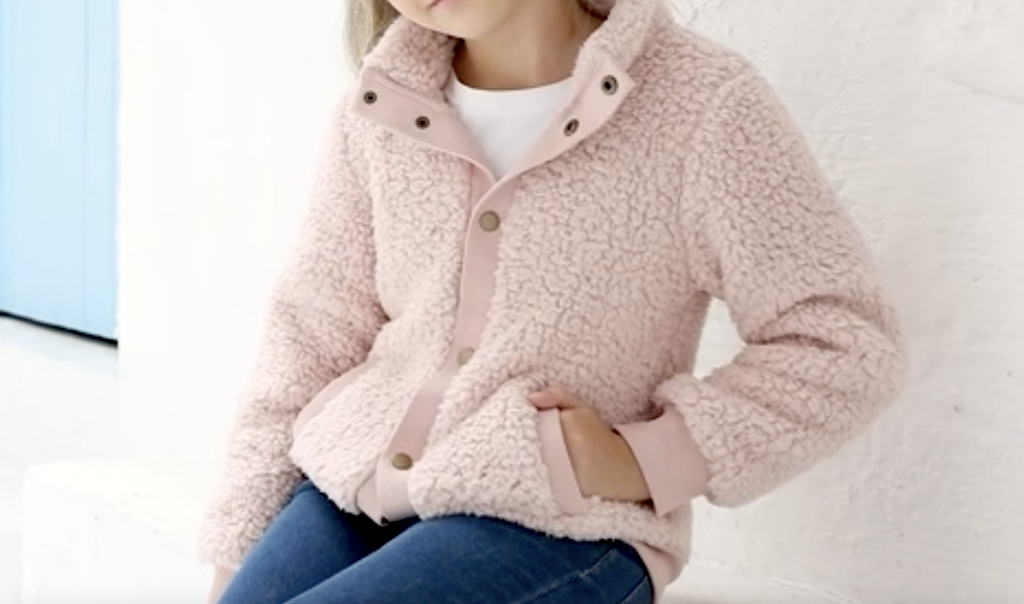 little girl wearing pink fleece jacket 