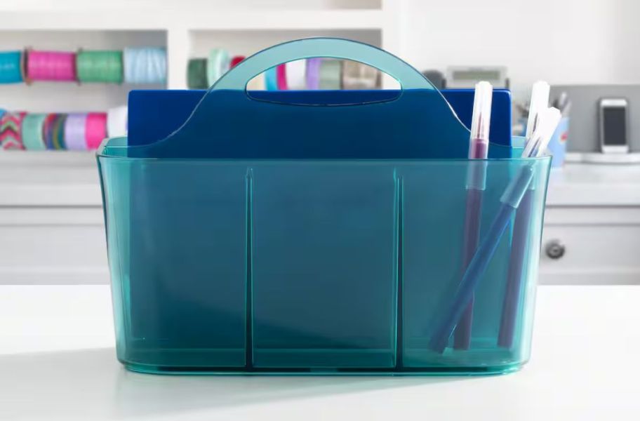 an aqua tinted storage caddy