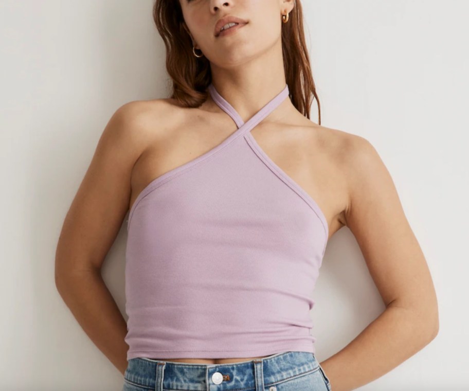 woman leaning back in lilac halter top