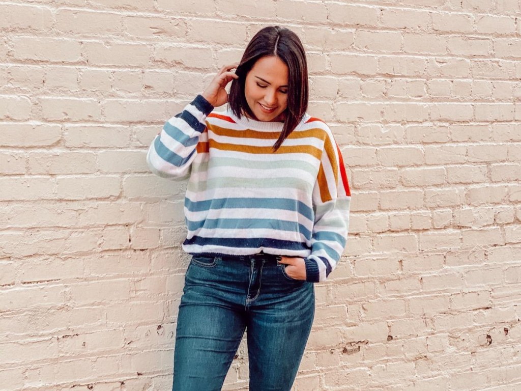 woman wearing striped sweater outside