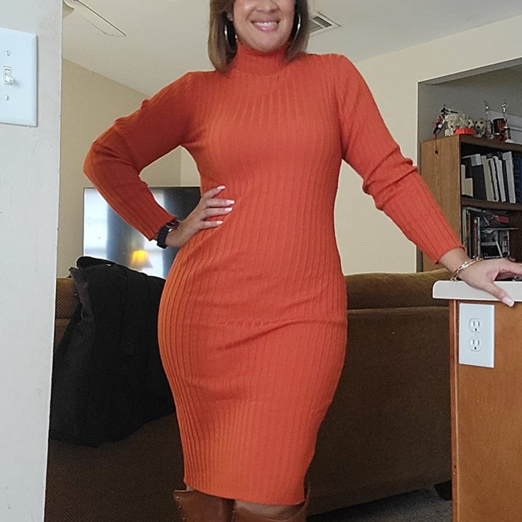 woman wearing rust-colored sweater dress