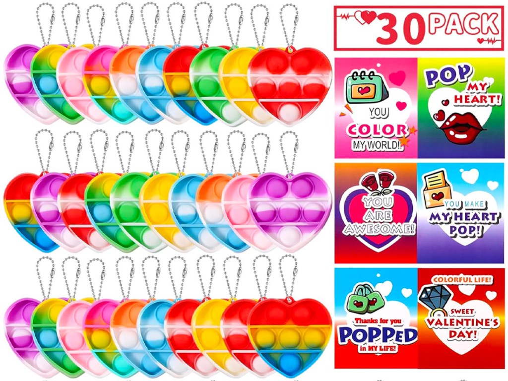 30 mini heart pop toys on keychains next to valentines cards