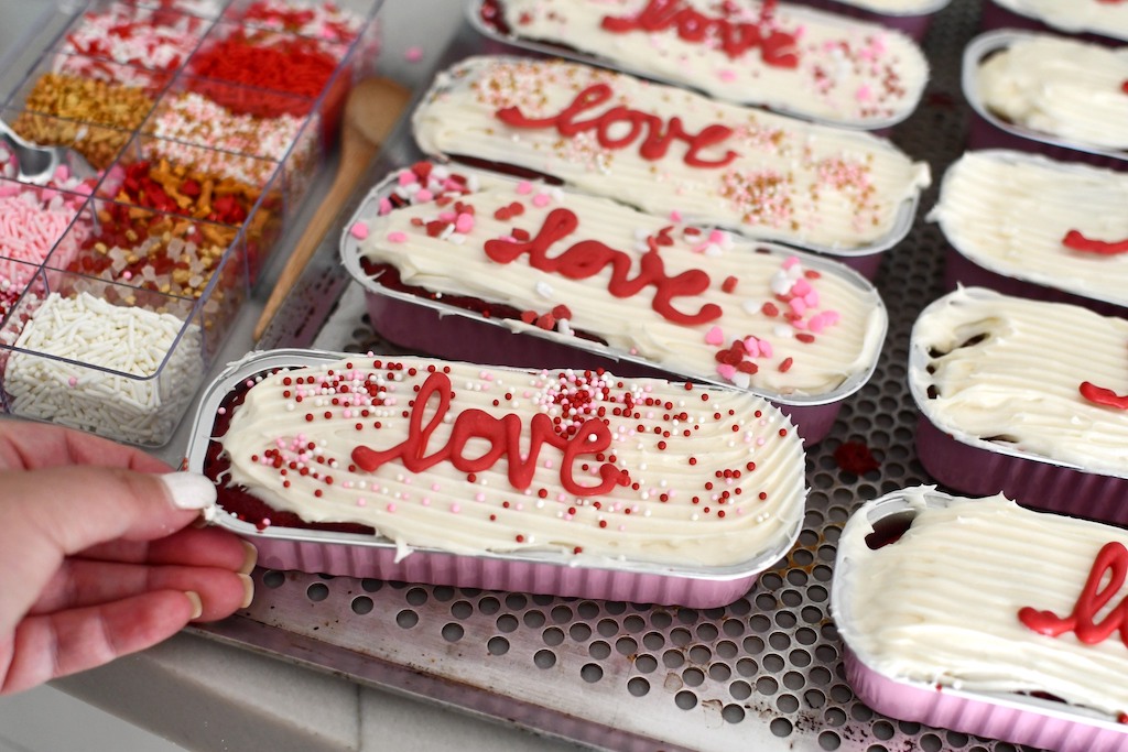 mini loaf pans with Valentine's cakes in them 
