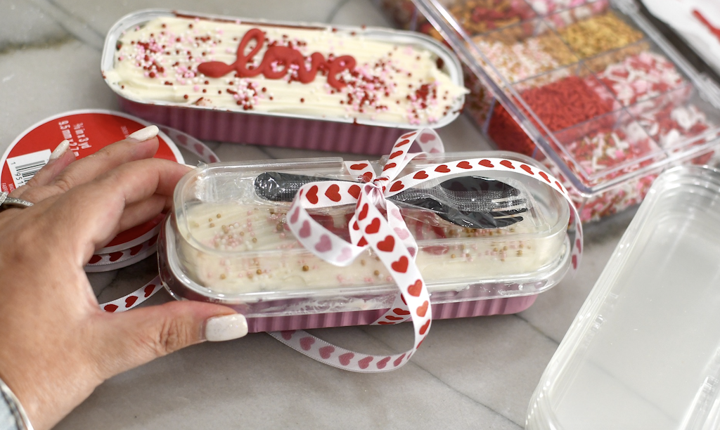 mini loaf pans with cake and heart ribbon 