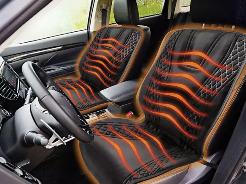 image of inside of car with heated car seat covers with mock heat waves on the front seats