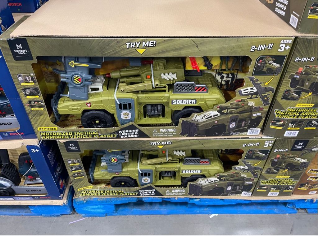 motorized tactical armoured vehicle playset stacked on a shelf in a store