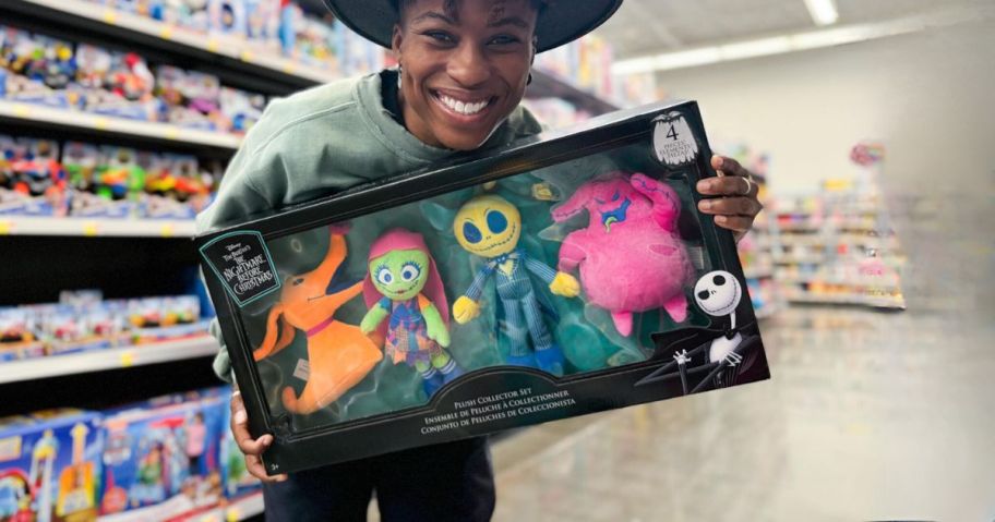 woman holding Nightmare Before Christmas Plush Collector Set in store