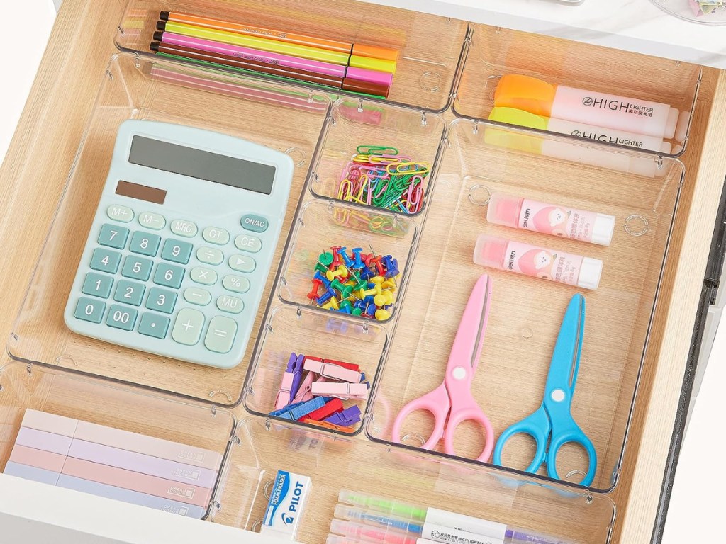 office supplies organized with items inside of them