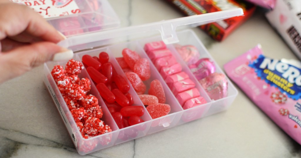 opening a tackle box with valentine's day candy
