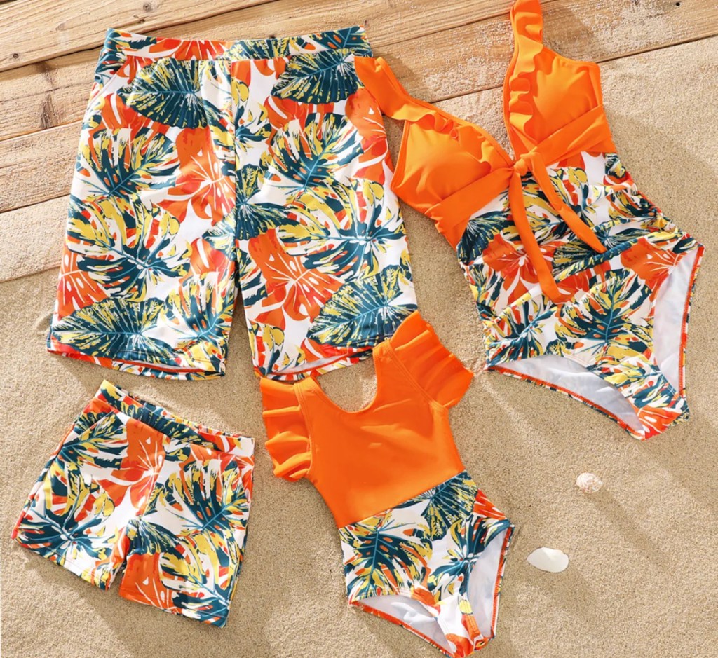 orange and tropical print swimsuits for the family