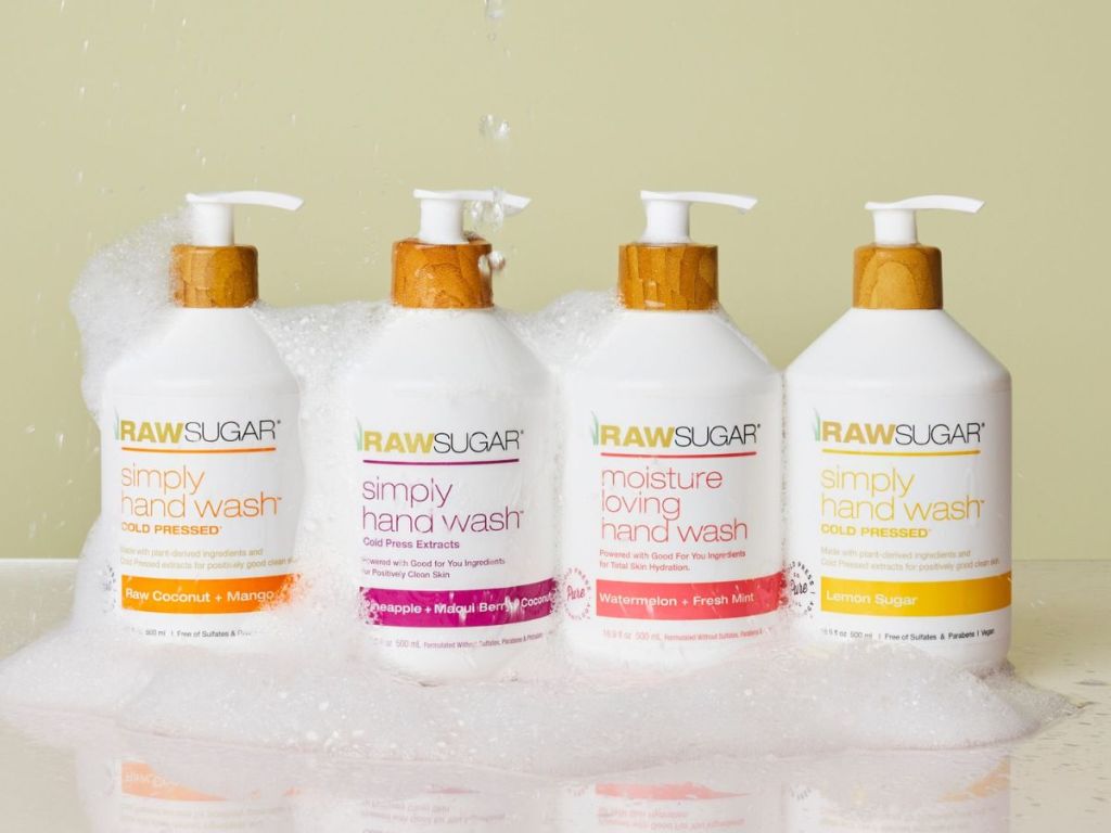 4 bottles of raw sugar hand soap with bubbles