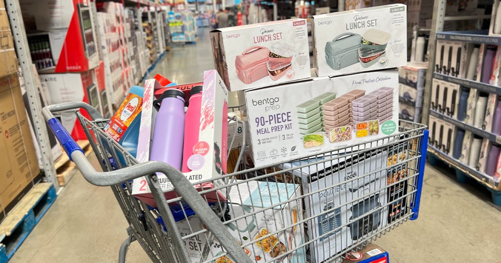sams club shopping cart full of products like zulu bottles, bentgo meal prep and lunch boxes and more