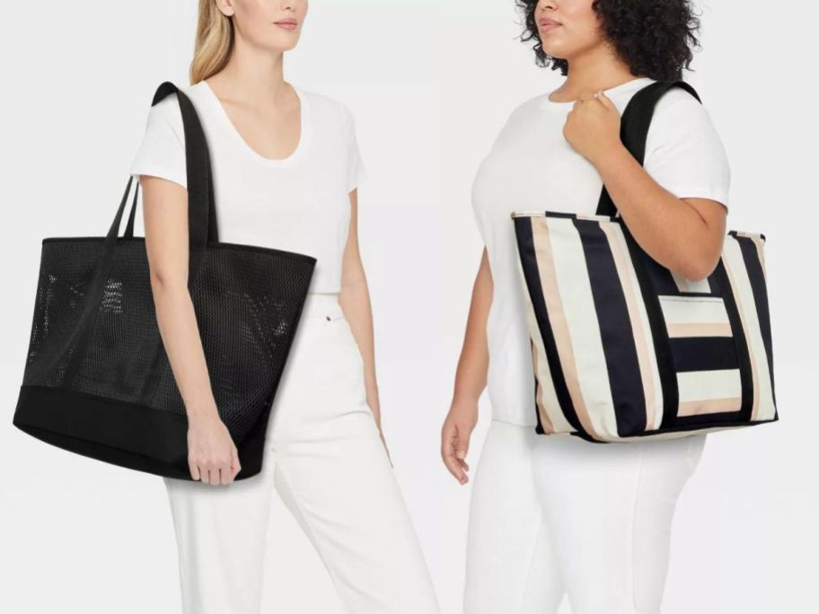 two models with large tote bags on shoulders