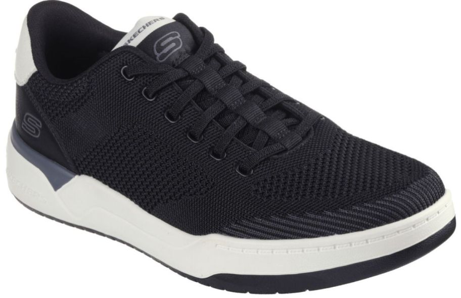 a black men's lace up sneaker with a white sole