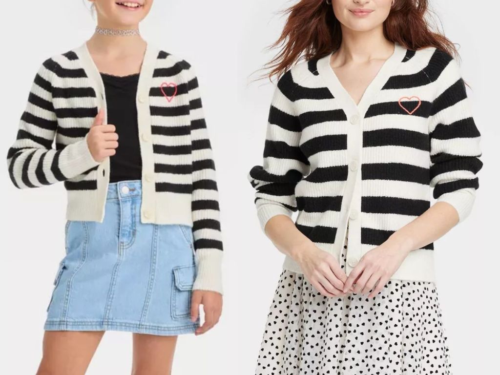 girl and woman wearing matching black and white stripe button down vneck cardigans that have a heart on them