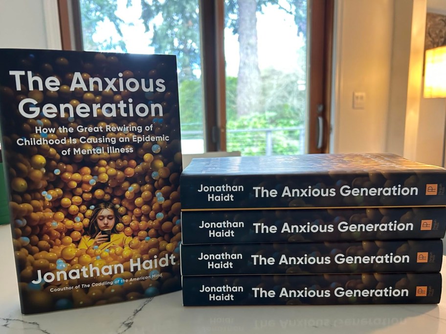 five hardcover copies of The Anxious Generation book