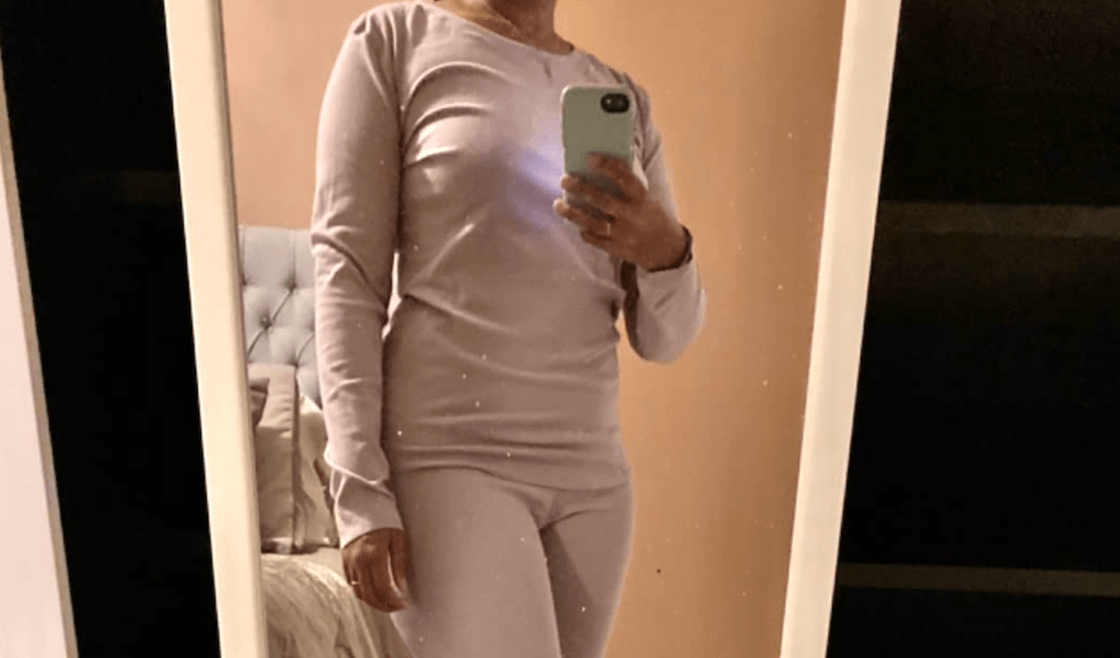 woman wearing thermal set in mirrors 