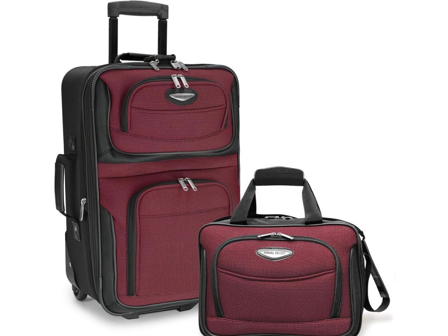 two maroon luggage pieces carry on and bag