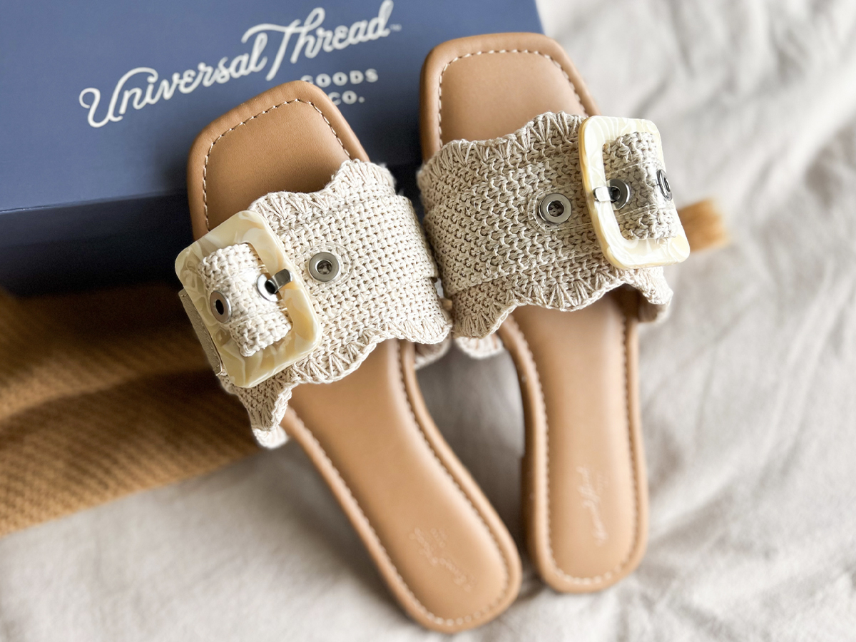 pair of universal thread beige sandals laying on box