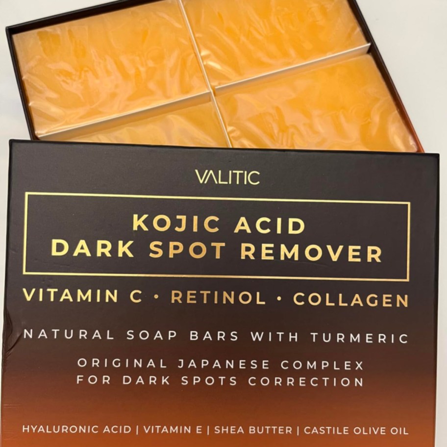 open box with 4 bars of orange soap inside
