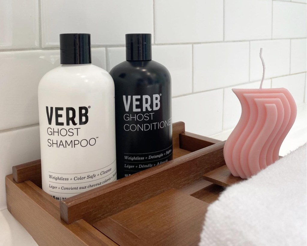 verb shampoo and conditioner on wooden tray