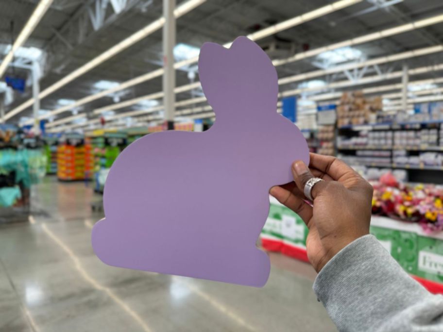 hand holding a Purple Rabbit Shaped Charcuterie Board 