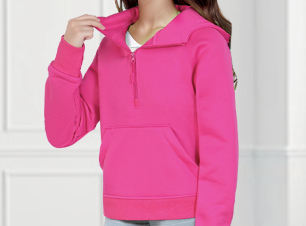 Girl wearing pink lululemon inspired sweatshirt 