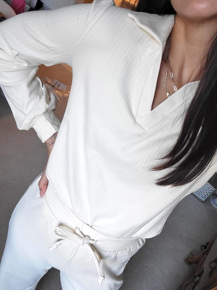 Woman wearing white lounge set 