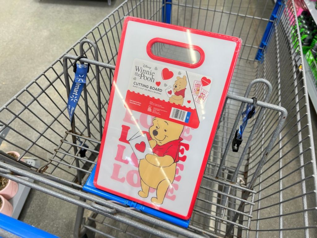 winnie the pooh cutting board in a walmart shopping cart