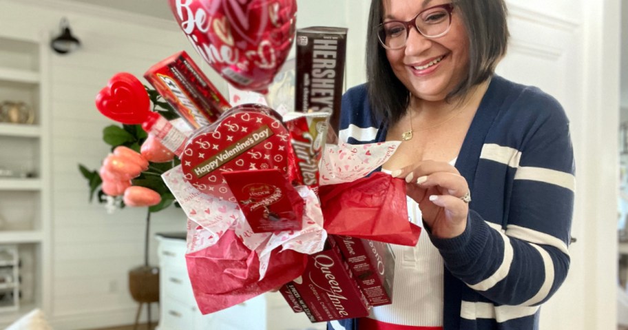 woman holding diy candy bouquet