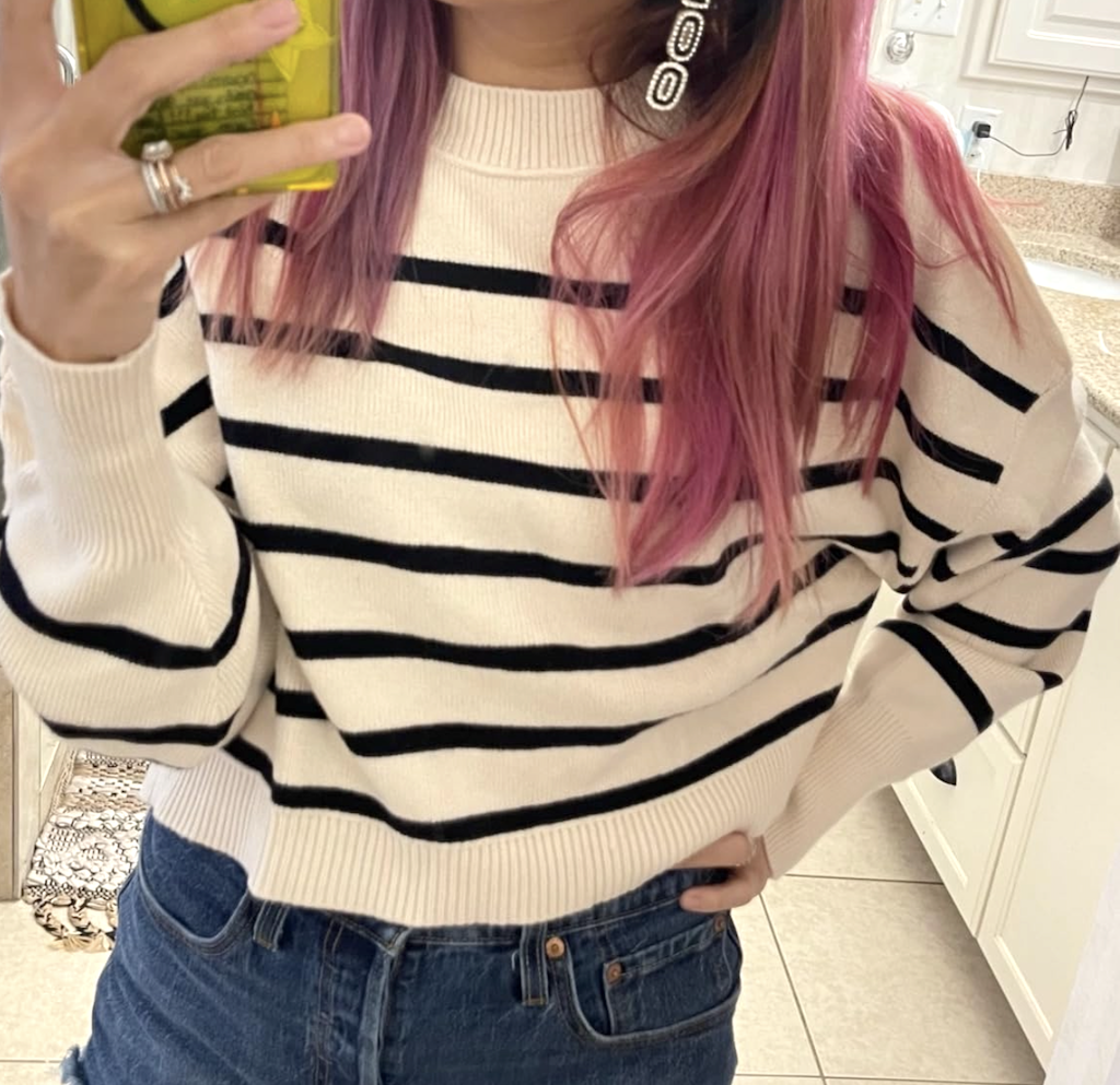 woman wearing striped cropped sweater 