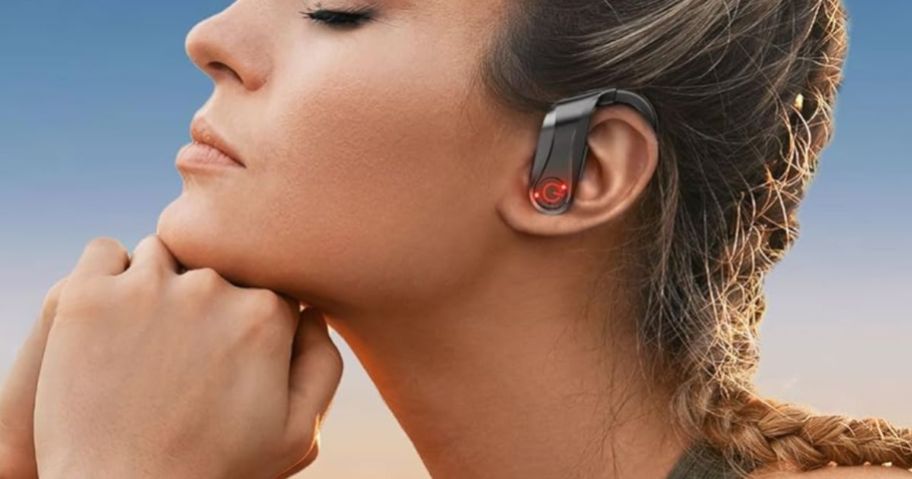 woman wearing a black Wireless Bluetooth Over-Ear Headphones