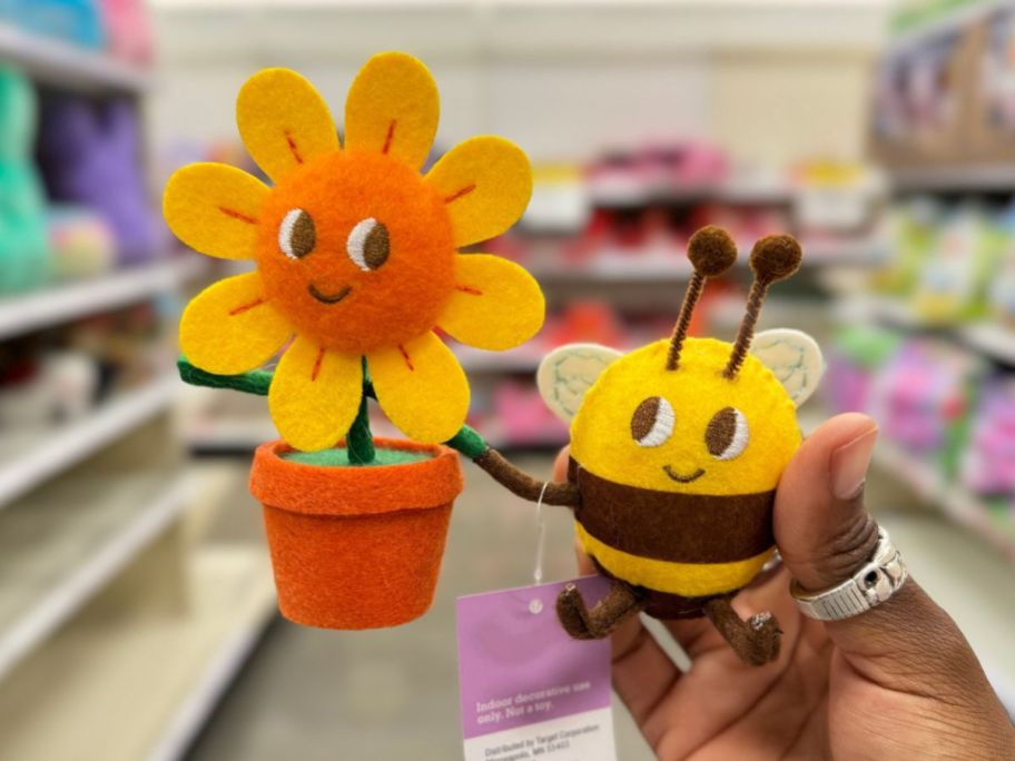 felt sunflower in a pot and bumblebee duo in person's hand