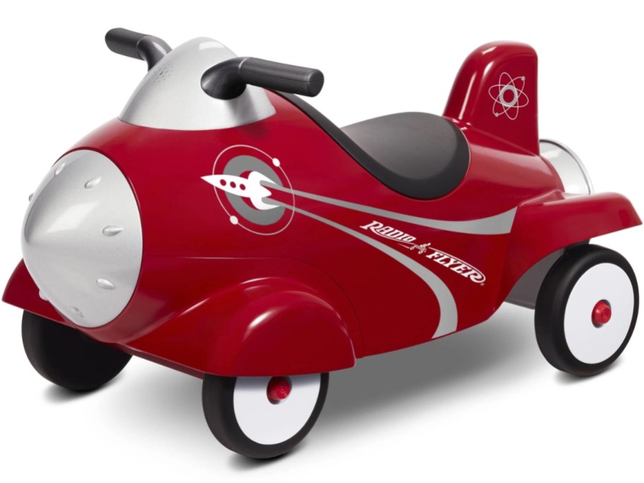 red, white and silver Radio Flyer Rocket shaped ride on toy for kids