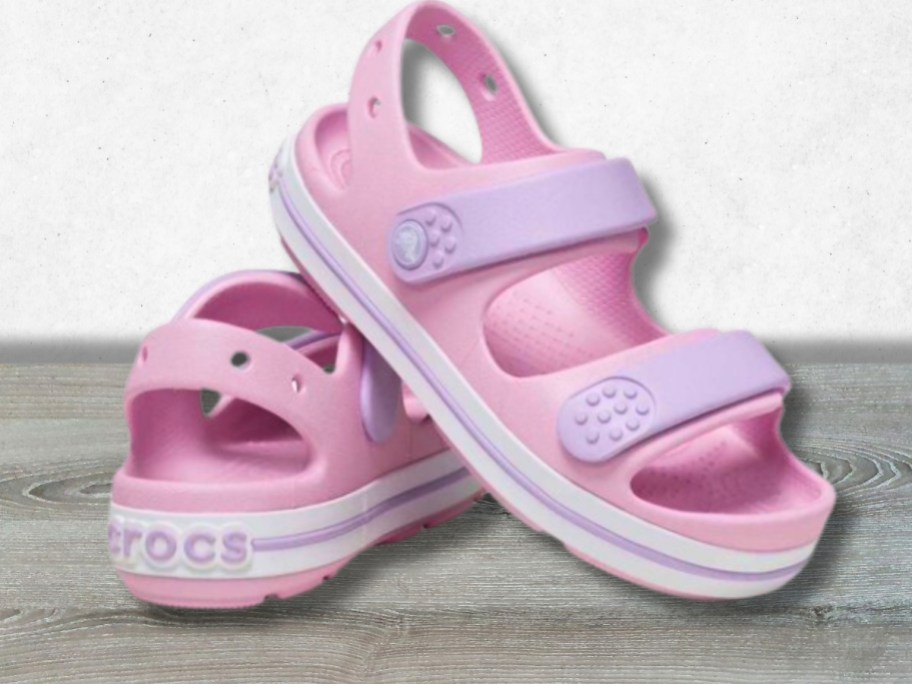 pink and purple kid's Crocs sandals