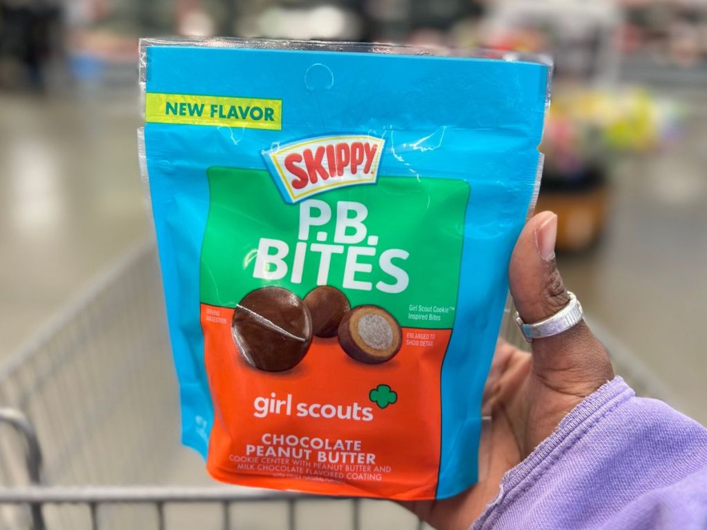 hand holding a bag of SKIPPY PB Bites Girl Scout Chocolate Peanut Butter