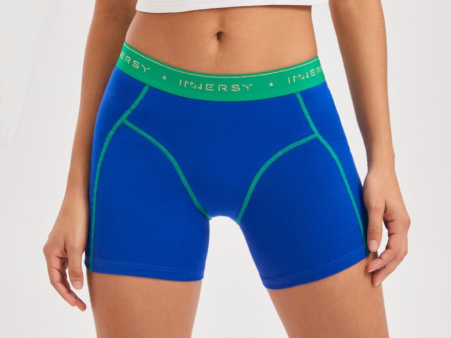 woman wearing a blue and green pair of Innersy Women's Boxers Brief Boyshorts 