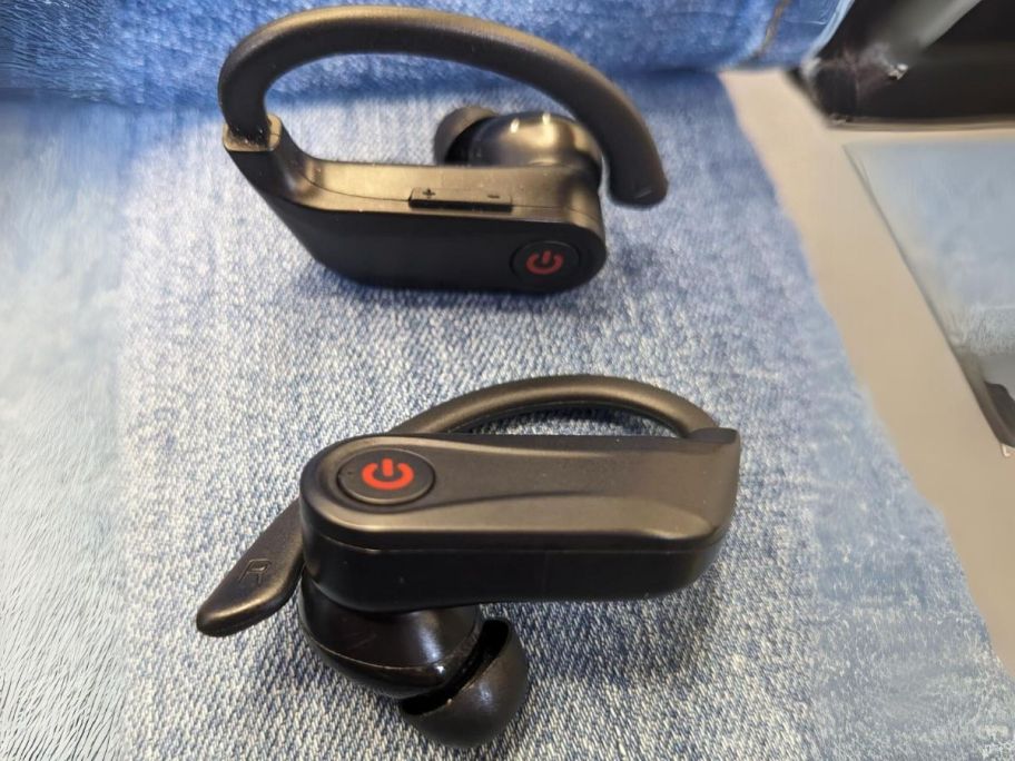 pair of black Wireless Bluetooth Over-Ear Headphones laying out