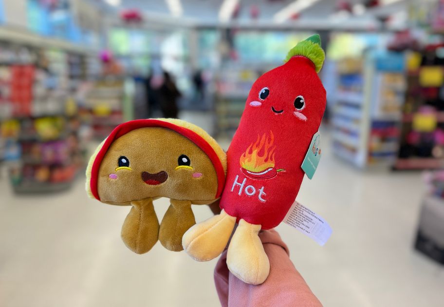 hand holding a Plush Pair - Taco and Hot Sauce