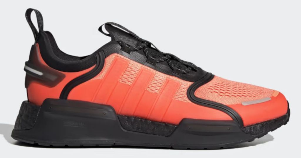 men's adidas tennis shoe in orange and black