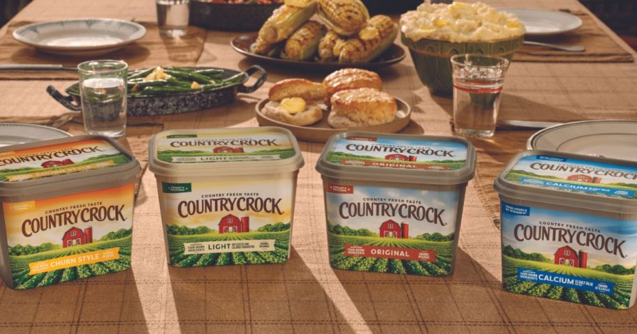 various country crock spreads on table with food in the background