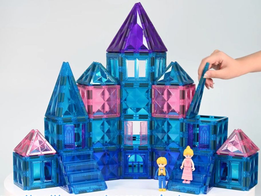 pink, blue and purple castle magnetic tiles building set shown built as a castle