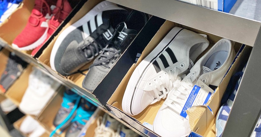 adidas shoes in box on store display