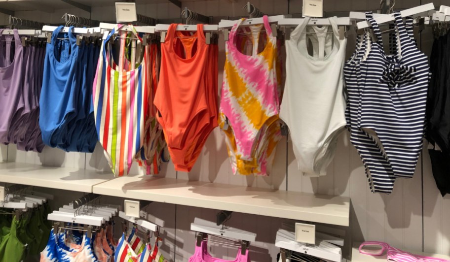 Colorful aerie swimsuits, hanging inside store
